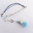 „Fluffy Sky“ Aquamarin Silberkette mit Bommel Lederband